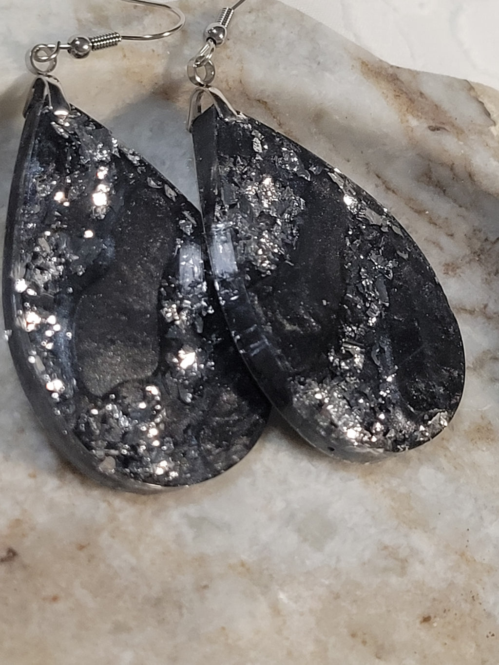Black and silver swirl resin dangle earrings
