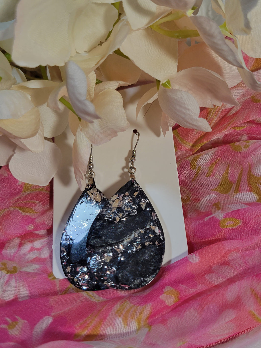 Black and silver swirl resin dangle earrings